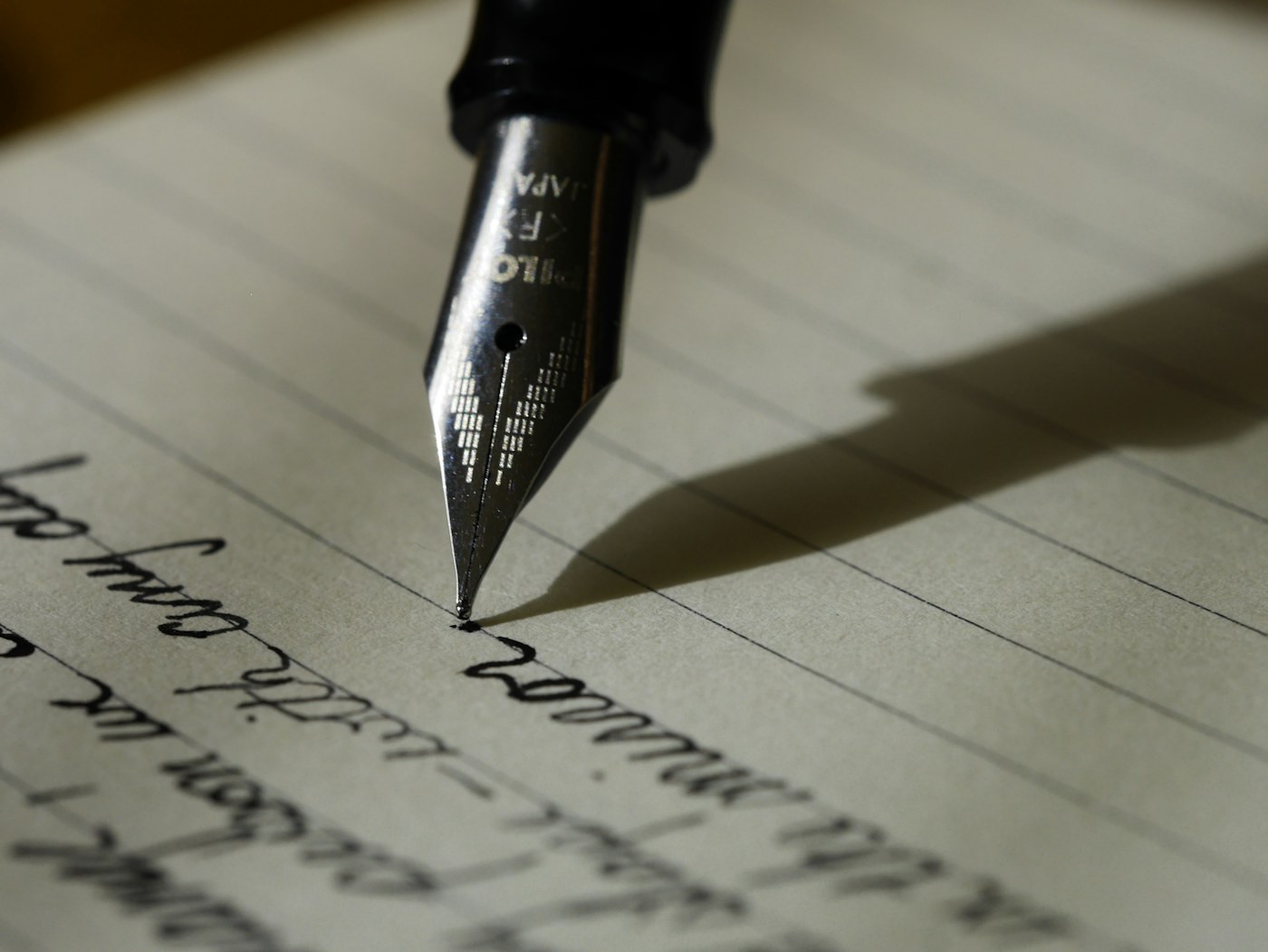 An open notebook with writing materials